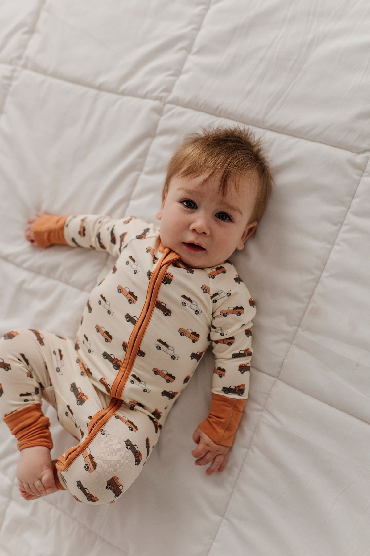 Baby Boy Long Sleeve Zip Romper in Pumpkin Trucks